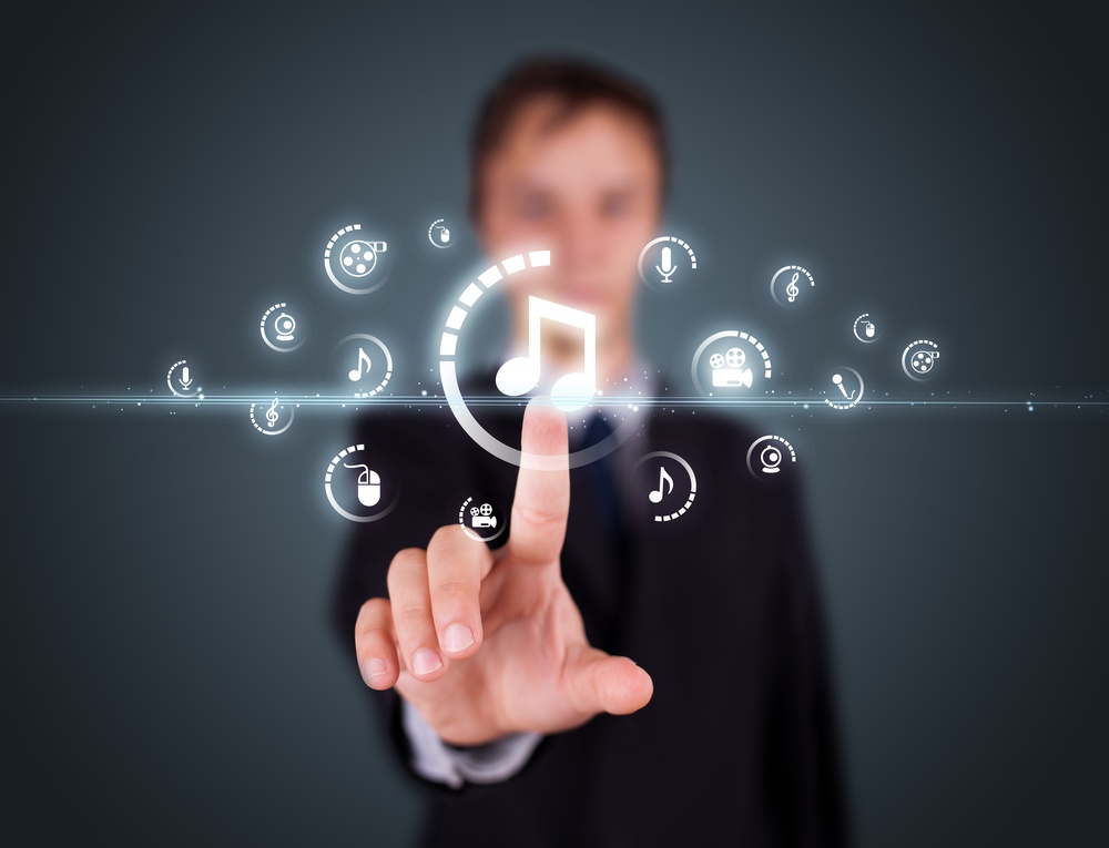 Businessman pressing multimedia type of modern buttons with virtual background.jpeg